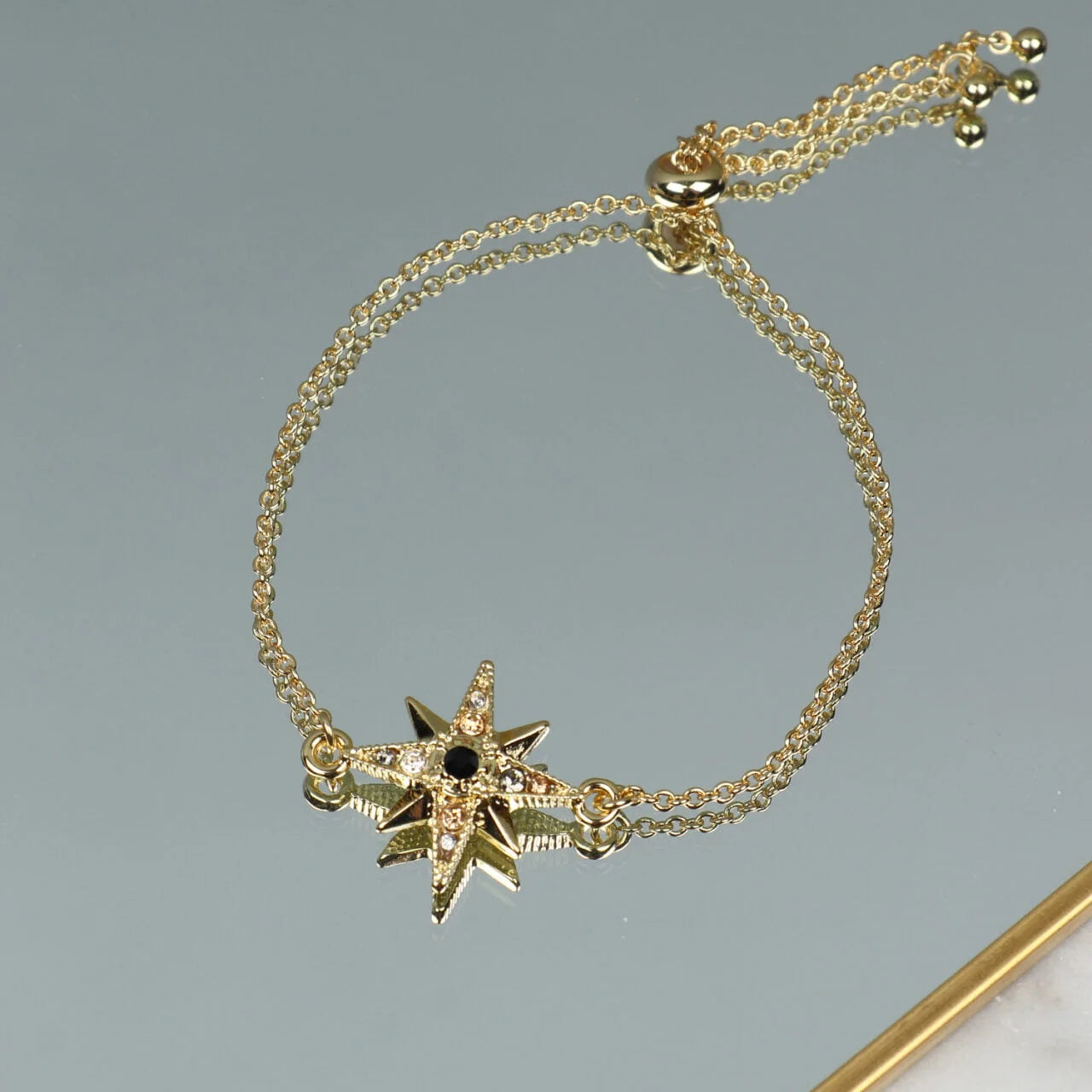 Fab Gifts | Jewellery Bracelet Gold Star Black by Weirs of Baggot Street