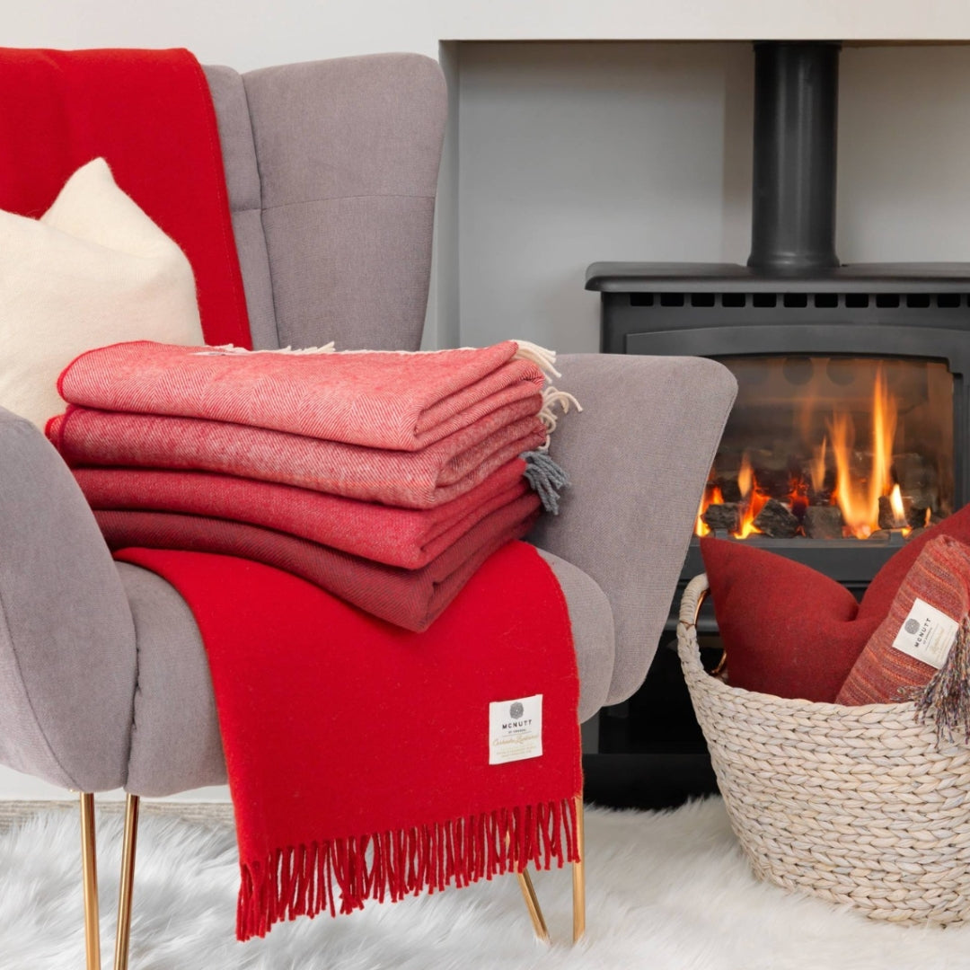 McNutt of Donegal | Lambswool Throw Berry Reversible by Weirs of Baggot Street